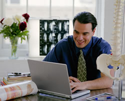 man on computer